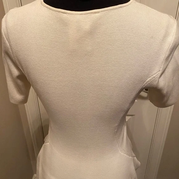 BCBGMAXAZRIA BCBG Cream peplum sweater top. SzM - Picture 2 of 8
